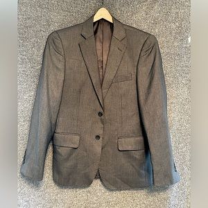 This is a regular fit sport coat. It is size Small and is a medium gray.